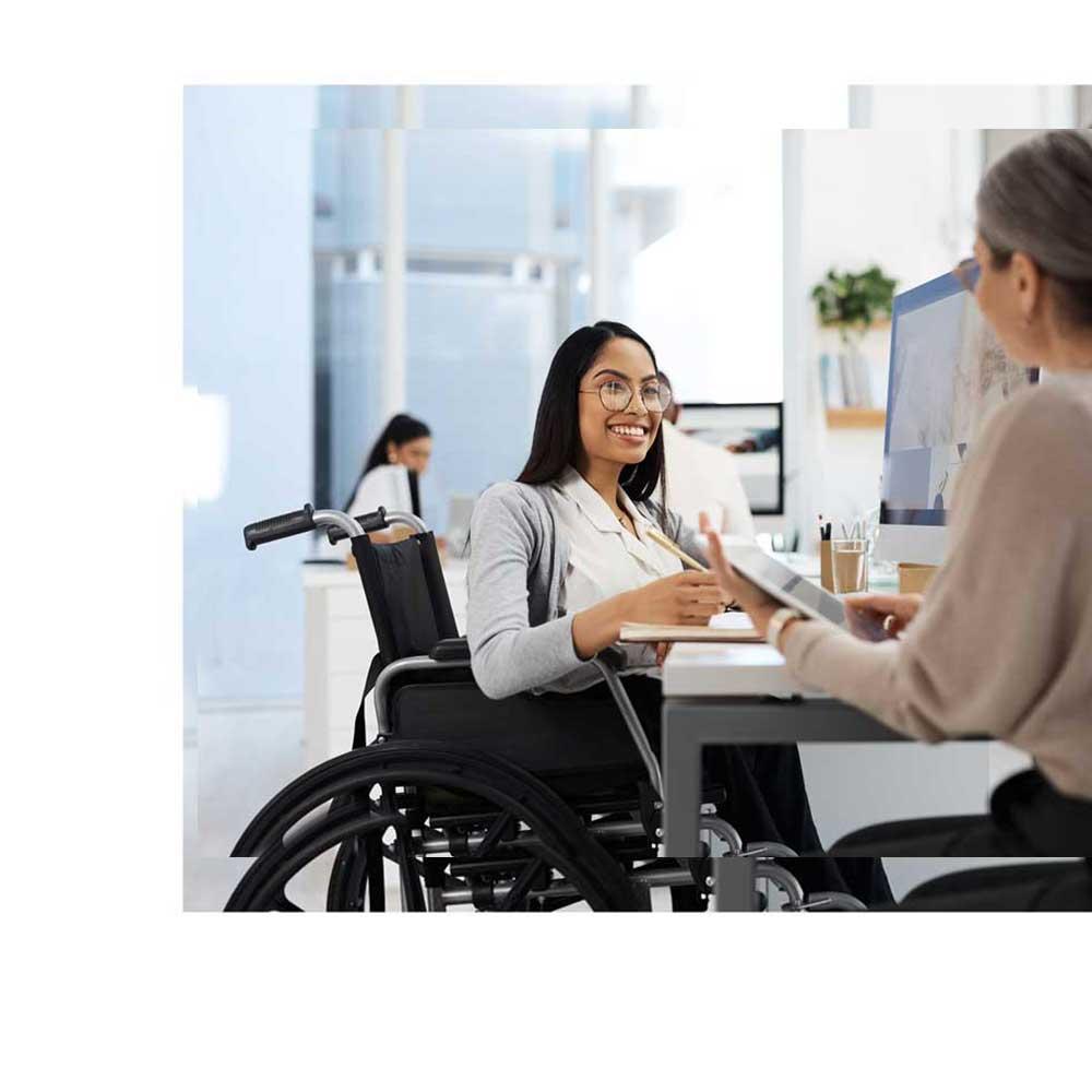 Young woman in wheelchair discussing CentralSquare community development software